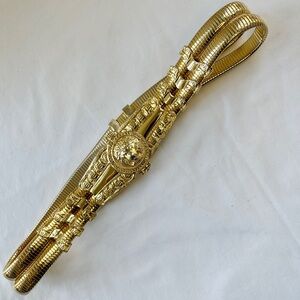 1980's Vintage Judith Leiber Gold Metal Lion Buckle Stretch Belt